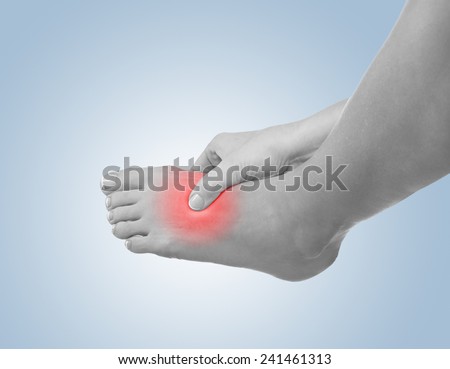 Human Ankle pain with an anatomy injury caused by sports accident or arthritis as a skeletal joint problem medical health care concept.