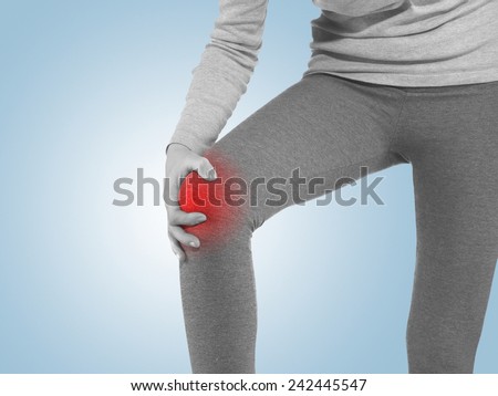 Human knee pain with an anatomy injury caused by sports accident or arthritis as a skeletal joint problem medical health care concept.