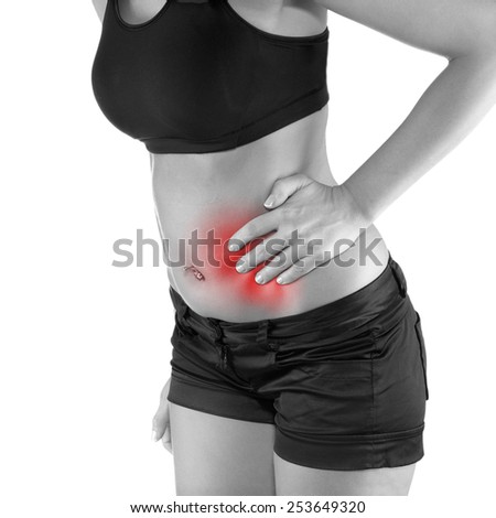 Woman with both palm around waistline to show pain and injury on belly area. Medical health care concept.