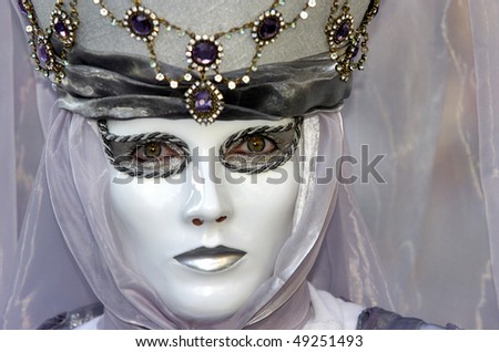 VENICE - FEB. 15: An unidentified person wears a mask at Carnival of Venice Feb. 15, 2007 in Venice. The annual carnival starts two weeks before Ash Wednesday and ends on Shrove Tuesday or Mardi Gras