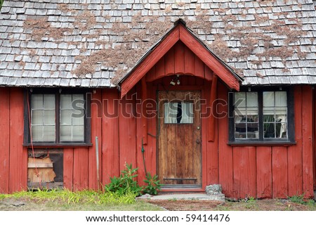 An old red cabin in the Northwest United States