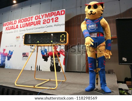 SUBANG JAYA - NOVEMBER 10: The event\'s mascot checks in on stage at the World Robot Olympaid competition on November 10, 2012 in Subang Jaya, Malaysia. Students from all over the world participate.