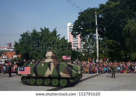KUALA LUMPUR - AUGUST 31: Armored personnel carriers from the armor units take to the city streets in a parade as Malaysians celebrate Independence Day on August 31, 2013 in Kuala Lumpur, Malaysia.
