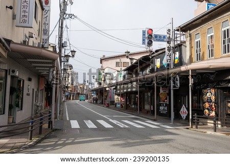 TAKAYAMA, JAPAN - DECEMBER 3, 2014: Low rise buildings and clean streets with few cars is a common cityscape find in Japan. Strong environmental laws keeps the nation clean and green.