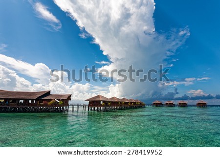 JUNE 27, 2008 - SABAH, MALAYSIA: Wooden chalet resorts cater for tourists visiting Mabul Island in Sabah. This island is situated next to Sipadan, a world famous scuba diving site.
