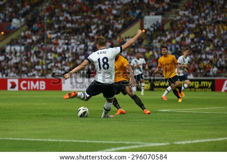 May 27, 2015- Shah Alam, Malaysia: Tottenham Hotspur's striker Harry Kane (18) kicks the ball in the friendly match against the Malaysian Selection Team. Tottenham Hotspur is on a Asia-Australia tour.