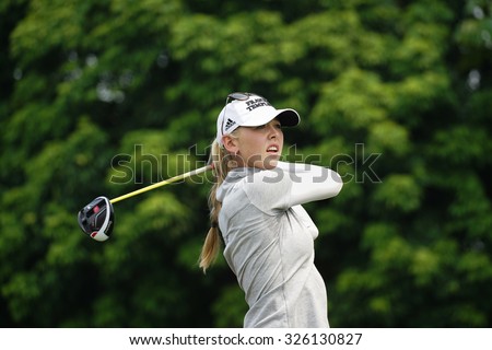 KUALA LUMPUR, MALAYSIA - OCTOBER 10, 2015: USA\'s Jessica Korda tees off at the sixth hole of the KL Golf & Country Club on Round 3 day at the 2015 Sime Darby LPGA Malaysia golf tournament.