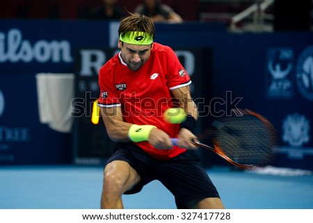 KUALA LUMPUR, MALAYSIA - OCTOBER 03, 2015: Spain\'s tennis player David Ferrer plays a backhand return at the 2015 Malaysian Open tennis tournament from Sep 26 - Oct 4, 2015 in Stadium Putra.