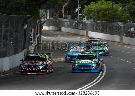 KUALA LUMPUR, MALAYSIA - AUGUST 08, 2015: Turbo charged V8 supercars take part in the V8 Supercars Street Challenge at the 2015 Kuala Lumpur City Grand Prix.