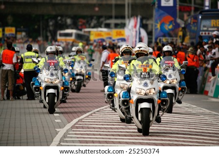Police escorts cyclists in KL