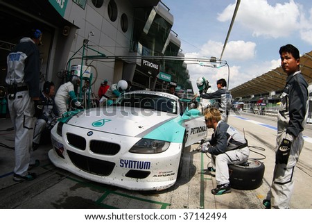 SEPANG, MALAYSIA - AUGUST 8: Petronas Team car refuels during pit stop at the 12 hour race of the 2009 Merdeka Millennium Endurance Race August 8, 2009 in Sepang, Malaysia.