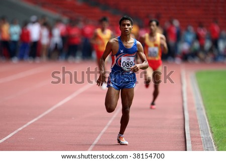 KUALA LUMPUR - AUGUST 15: Thailand\'s visually impaired athlete wins the 800m race at the track and field event of the fifth ASEAN Para Games on August 15, 2009 in Kuala Lumpur.