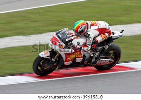 SEPANG, MALAYSIA - OCTOBER 25: Team Honda Gresini\'s Alex de Angelis in  the 2009 Shell Advance Malaysian Motorcycle GP. October 25, 2009 in Malaysia.
