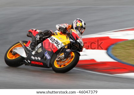 SEPANG - FEBRUARY 05: Dani Pedrosa of the Repsol Honda team practices in the pre-season testing in preparation for the MotoGP championship. February 05, 2010 in Sepang, Malaysia.