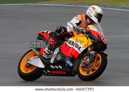 SEPANG - FEBRUARY 05: Andrea Dovizioso of the Repsol Honda team practices in the pre-season testing in preparation for the MotoGP championship. February 05, 2010 in Sepang, Malaysia.