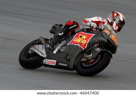 SEPANG - FEBRUARY 05: Marco Melandri of the San Carlo Honda team practices in the pre-season testing in preparation for the MotoGP championship. February 05, 2010 in Sepang, Malaysia.