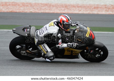 SEPANG - FEBRUARY 05: Hiroshi Aoyama of the Interwetten Honda team practices in the pre-season testing in preparation for the MotoGP championship. February 05, 2010 in Sepang, Malaysia.