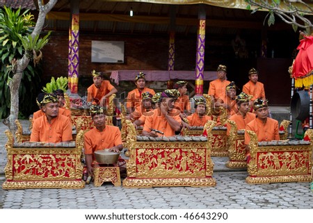 BALI - JANUARY 15: Musicians in the Gamelan troupe play traditional Balinese music to accompany dancers in a \'full moon ceremony\' in the Bedulu village, Bali. January 15, 2010 in Bali, Indonesia.