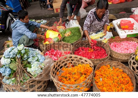 BALI - JANUARY 17: Commercial activities in the main Ubud market, showing florist sells flower products, Bali January 17, 2010 in Bali, Indonesia.