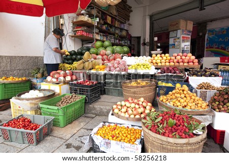 YANGSHOU, CHINA - MAY 20: A well stocked fruits shop selling a variety of local and imported fruits May 20, 2010 in Yangshou, China.