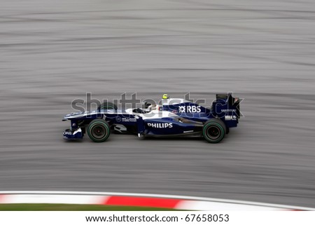 KUALA LUMPUR - APRIL 4: Williams-Cosworth driver Nico Hulkenberg takes the hairpin turn at turn 15 on race day at the 2010 Petronas Malaysia Grand-Prix  April 4, 2010 in Sepang International Circuit.
