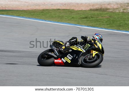 SEPANG, MALAYSIA - FEBRUARY 2: MotoGP rider Colin Edwards of Monster Yamaha Tech 3 Team practices at the MotoGP winter tests at the Sepang International Circuit on February 2, 2011 in Malaysia.