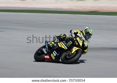 SEPANG, MALAYSIA - FEBRUARY 2: MotoGP rider Cal Crutchlow of the Monster Yamaha Tech 3 Team practices at the 2011 MotoGP winter tests at the Sepang International Circuit. February 2, 2011 in Malaysia
