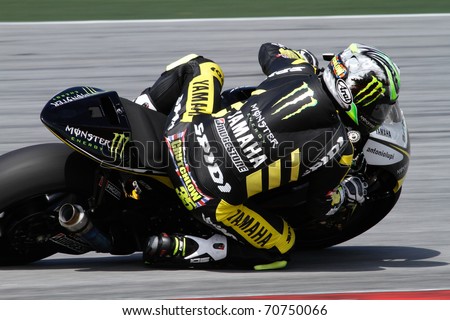 SEPANG, MALAYSIA - FEBRUARY 2: MotoGP rider Cal Crutchlow of the Monster Yamaha Tech 3 Team practices at the 2011 MotoGP winter tests at the Sepang International Circuit. February 2, 2011 in Malaysia