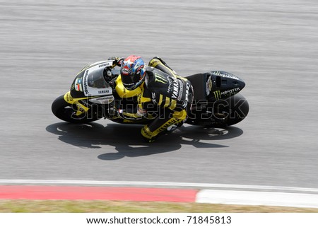 SEPANG, MALAYSIA - FEBRUARY 23: MotoGP rider Colin Edwards of Monster Yamaha Tech 3 team practices at the 2011 MotoGP winter tests at the Sepang International Circuit. February 23, 2011 in Malaysia.