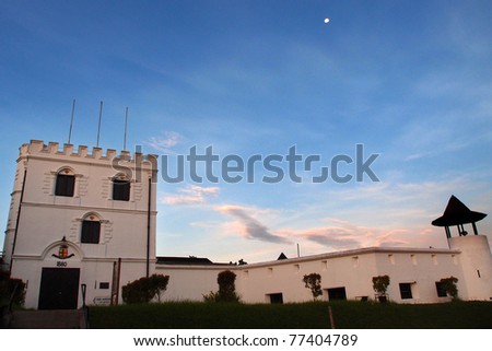 KUCHING - MAY 14: The moon rises over the walls of Fort Magherita, May 14, 2011 in Kuching, Malaysia. Fort Magherita was built in 1880 by the British to defend the town from invaders.