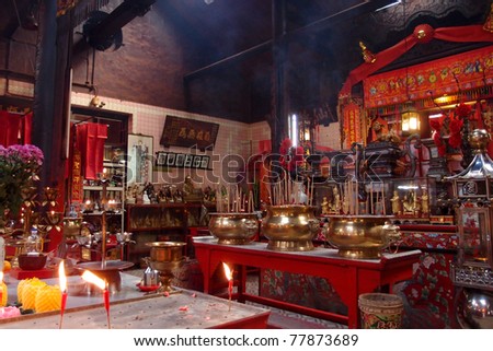 KUALA LUMPUR - MAY 22: Lavish offerings fill the altars at the Sze Ya temple on May 22, 2011 in Kuala Lumpur, Malaysia. This temple was founded in 1864 by Yap Ah Loy and Chinese immigrants.