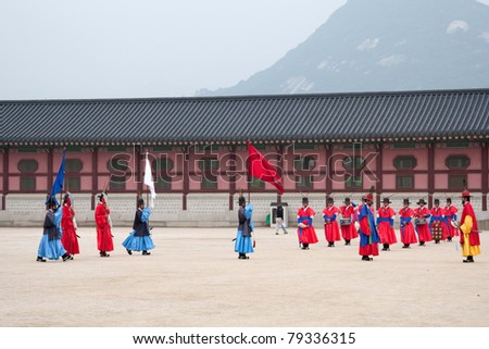 SEOUL - JUNE 09: Changing of the guards ceremony takes place at the Gyeongbokgong Palace on June 09, 2011 in Seoul, South Korea. This event dates back to the Joseon Dynasty over 700 hundred years ago.