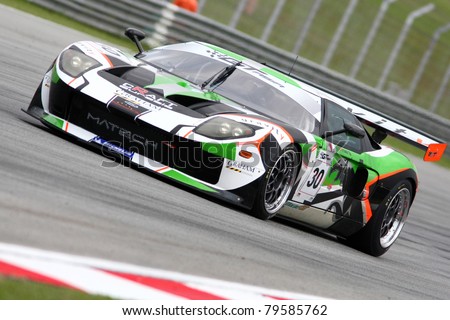SEPANG - JUNE 17: Frank Yu of Craft Eurasia Racing in a Ford GT GT3 takes to the tracks of the Sepang International Circuit at the GT Asia Series race on June 17, 2011 in Sepang, Malaysia.