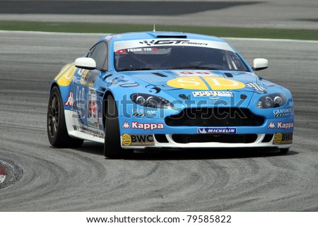 SEPANG - JUNE 17: Frank Yee of S&D Motorsports in a Aston Martin Vantage N24 takes to the tracks of the Sepang International Circuit at the GT Asia Series race on June 17, 2011 in Sepang, Malaysia.