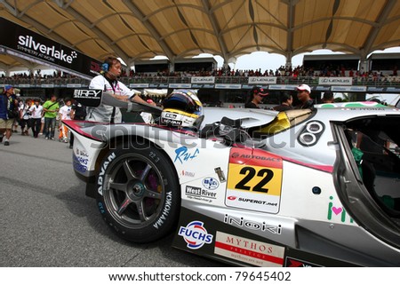 SEPANG, MALAYSIA - JUNE 19: Team R\'Qs Motorsport\'s Vemac car waits on the track of the Sepang International Circuit before the start of the Japan SUPER GT Round 3 race on June 19, 2011 in Sepang, Malaysia.