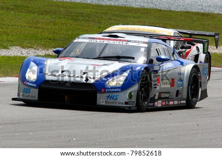 SEPANG, MALAYSIA - JUNE 18: The Nissan GTR car of Kondo Racing team puts in some practice laps in the Sepang International Circuit at the Japan SUPER GT Round 3 on June 18, 2011 in Sepang, Malaysia.
