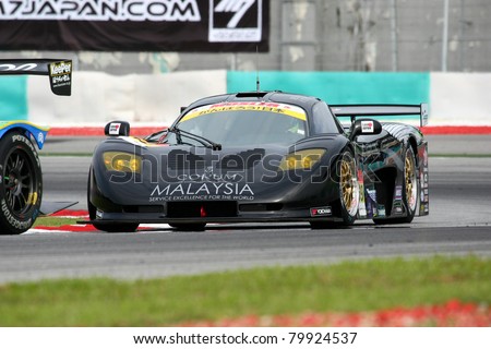 SEPANG - JUNE 18: The Mosler MT900M car of ThunderAsia Racing puts in some practice laps in the Sepang International Circuit at the Japan SUPER GT Round 3 on June 18, 2011 in Sepang, Malaysia.
