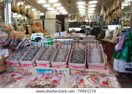 DAEPOHANG FISH MARKET - JUNE 06: A shop front displays packed desiccated seafood products for sale on June 06, 2011 in Daepohang, South Korea. This market is a tourist attraction at this port town.