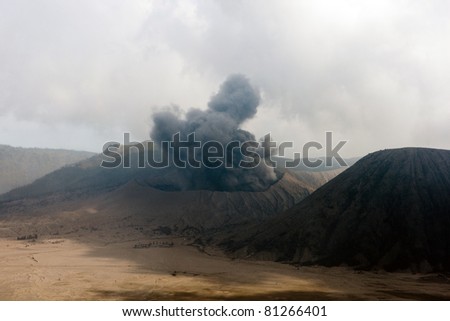 JAVA, INDONESIA - JULY 1: Mount Bromo erupts spewing out ash and smoke on July 1, 2011 in Java, Indonesia. Indonesia sits on the \'ring of fire\' with many active volcanoes and prone to earthquakes.