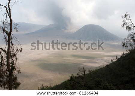 JAVA, INDONESIA - JULY 1: Mount Bromo erupts spewing out ash and smoke on July 1, 2011 in Java, Indonesia. Indonesia sits on the 'ring of fire' with many active volcanoes and prone to earthquakes.