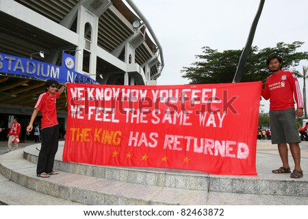 BUKIT JALIL - JULY 16: Soccer fans show their support for Liverpool FC outside the stadium before the match against Malaysia at the National Stadium on July 16, 2011, Bukit Jalil, Malaysia.