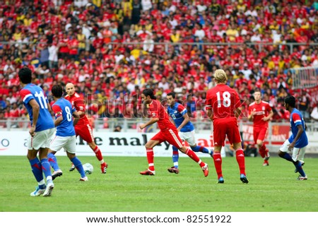 BUKIT JALIL - JULY 16 : Liverpool FC\'s captain Dirk Kuyt (18) leads his team\'s attack in this game against Malaysia at the National Stadium on July 16, 2011, Bukit Jalil, Malaysia. Liverpool won 6-3.