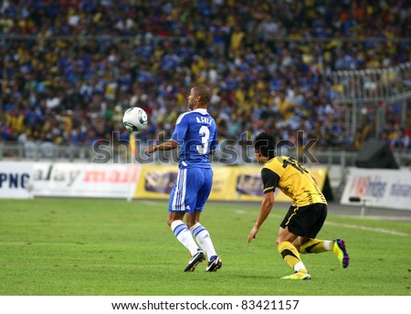 BUKIT JALIL, MALAYSIA - JULY 21: Chelsea\'s Ashley Cole (3) chests down the ball in this game against Malaysia at the National Stadium on July 21, 2011 in Bukit Jalil, Malaysia. Chelsea won 1-0.