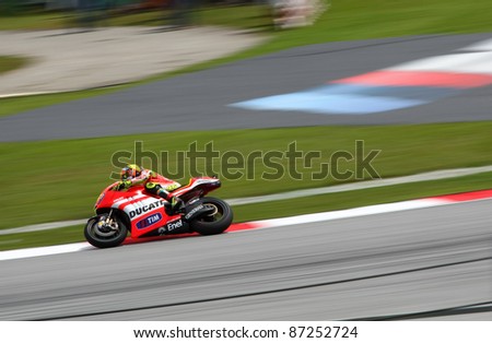 SEPANG, MALAYSIA - OCTOBER 22: MotoGP rider Valentino Rossi competes during qualifying session of the Shell Advance Malaysian Motorcycle Grand Prix 2011 on October 22, 2011 at Sepang, Malaysia.