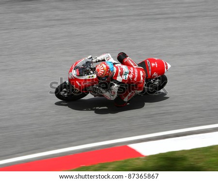 SEPANG, MALAYSIA - OCTOBER 23: 125cc rider Johann Zarco competes on race day of the Shell Advance Malaysian Motorcycle Grand Prix 2011 on October 23, 2011 at Sepang, Malaysia.