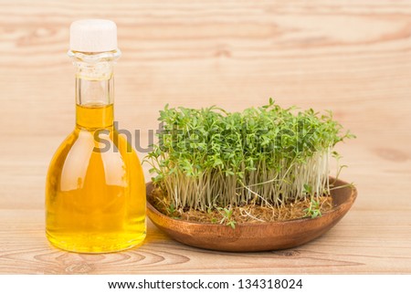 Fresh green watercress on a  wooden backgrounds