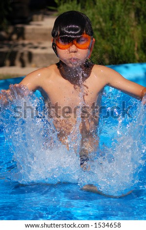 Kid in garden pool