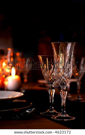 stock photo Elegant table setting with champagne glasses and candles