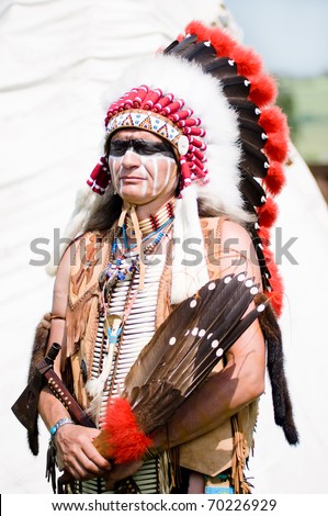 Portrait of american indian chief in national dress