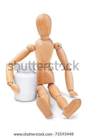Wooden man embracing medical container